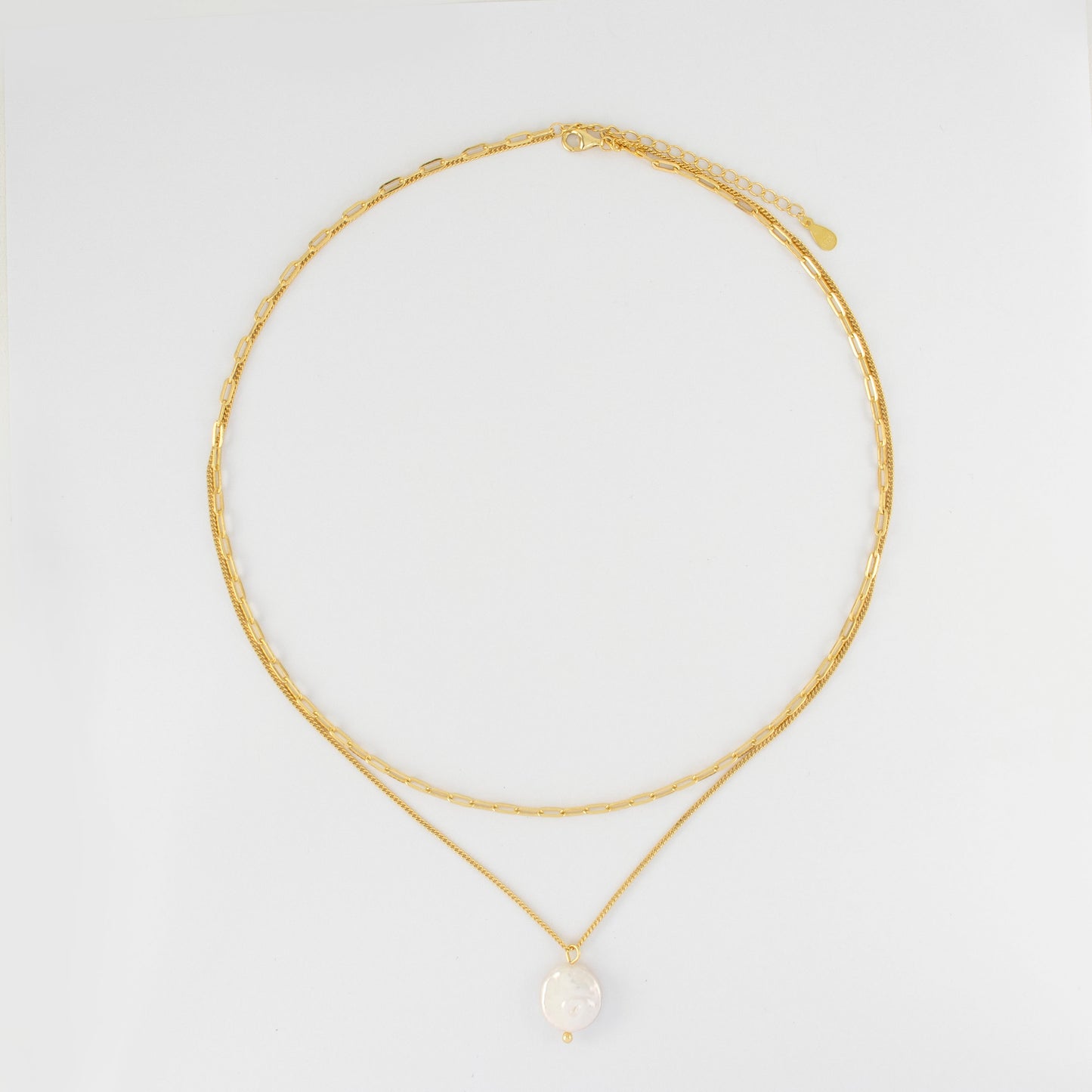 A sizable baroque pearl adorns the double beaded chain of this necklace, radiating simplicity and charm. mermadepearl