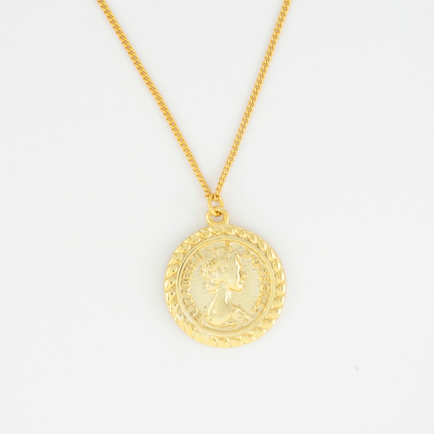 The necklace is adorned with a coin, layer with a relief of a queen and a flying horse on the reverse side.
