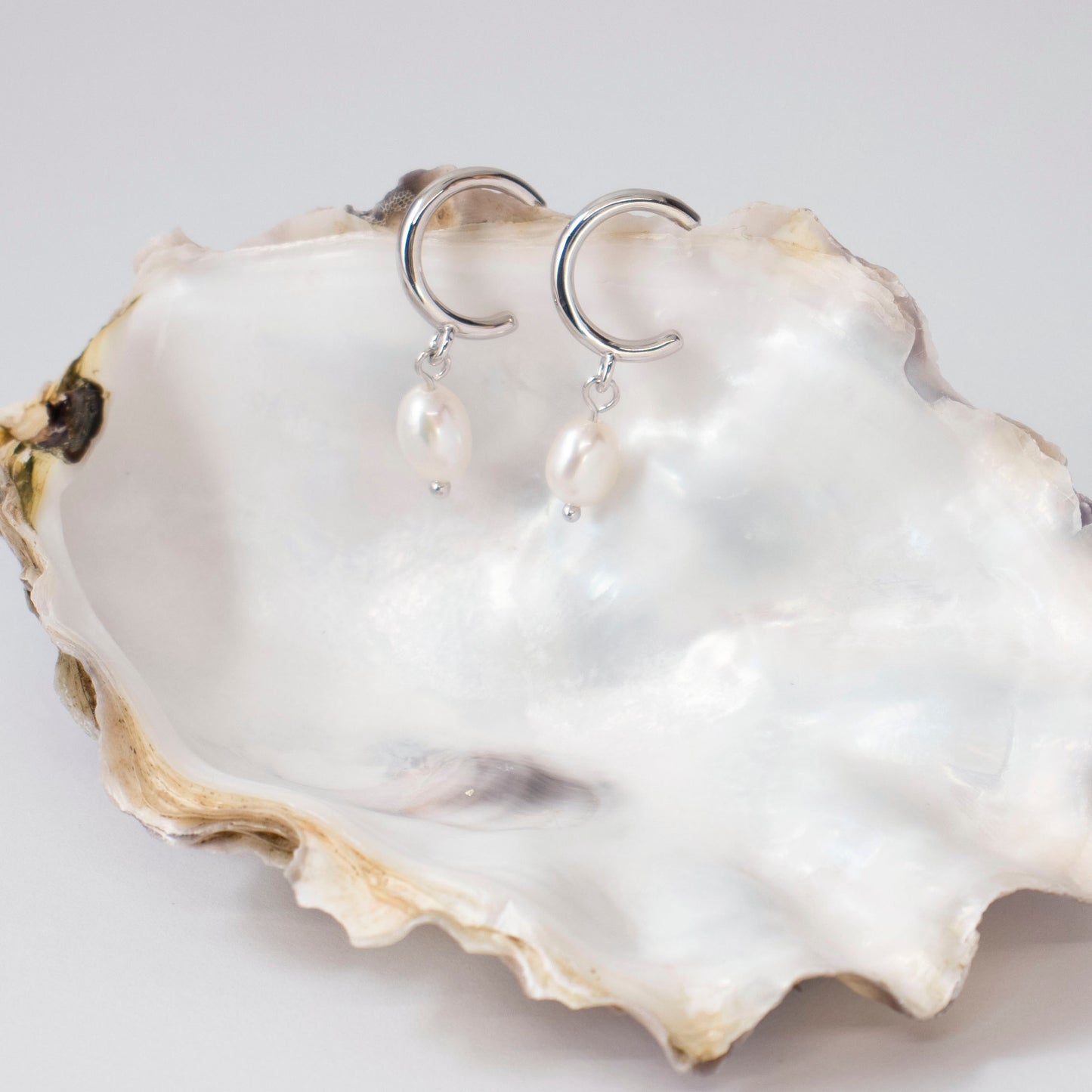 Andrina, the pearl drop earring.