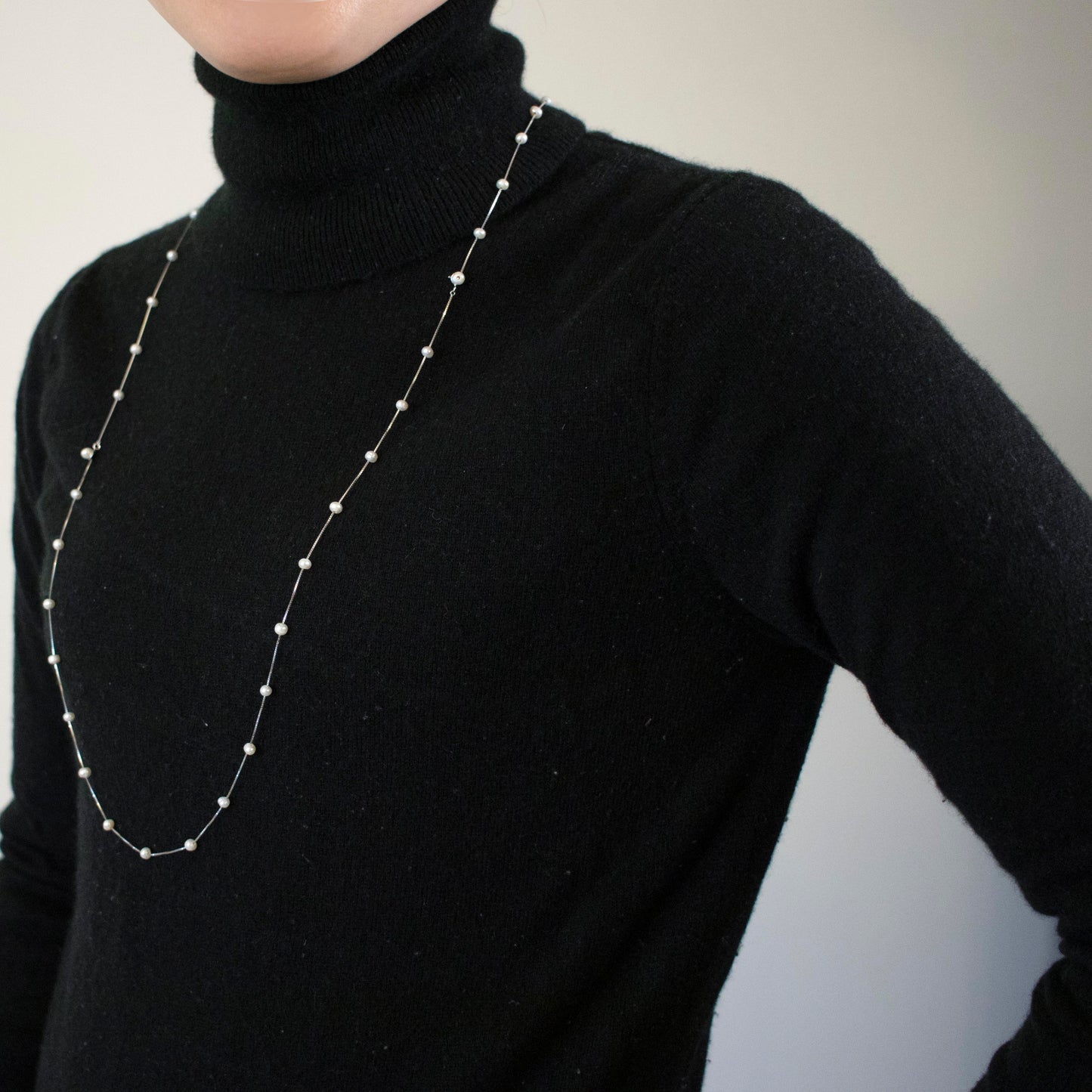 Necklace Etoile is adorned with 19 freshwater pearls, creating a constellation-like arrangement.
